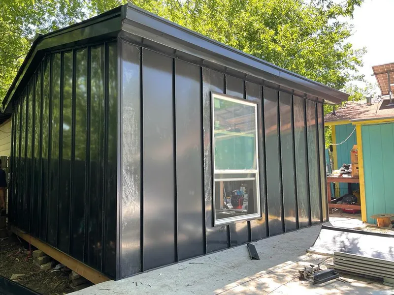 Black standing seam metal wall panels for Roof Inspection in Willow Oak