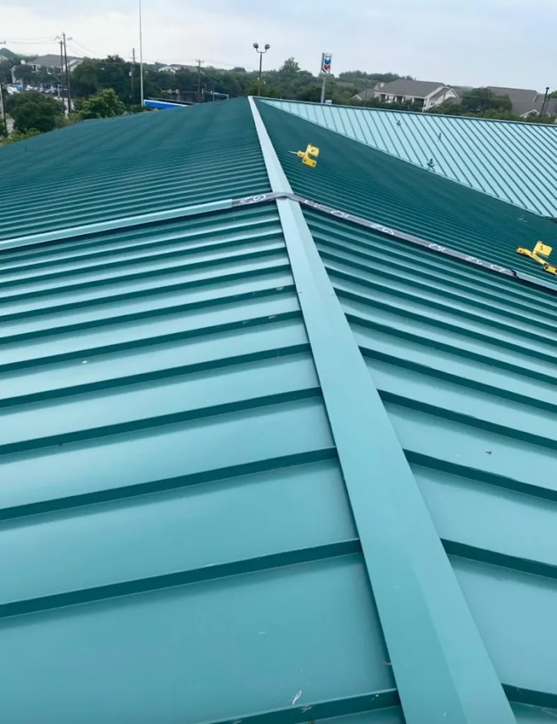 Green commercial metal roof ridge and valley for Metal Roof Repair in Willow Oak
